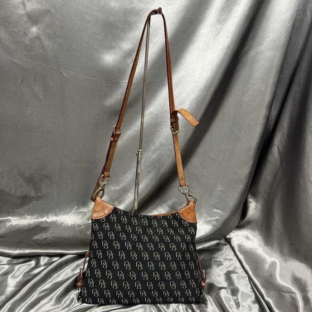 Dooney & Bourke‎ DB Monogram Canvas Hobo Shoulder Bag Black Leather Duck Charm